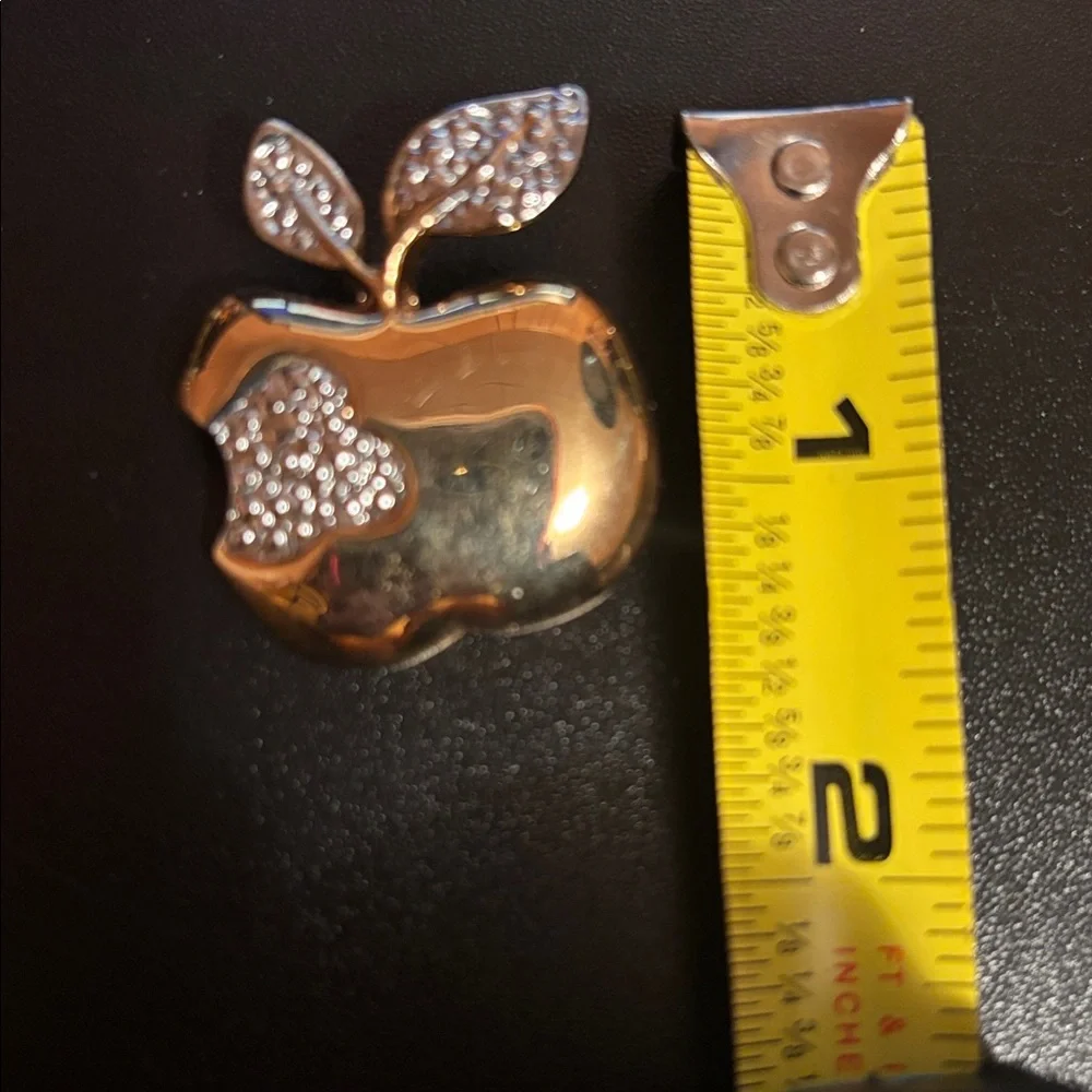 Vintage gold tone apple brooch w/ bite taken out silver tone bumpy texture